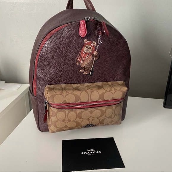 coach ewok backpack Star Wars X Medium Charlie in Signature With This faux fur design includes faux suede hood and faux leather detailing Star Wars X Coach Backpack